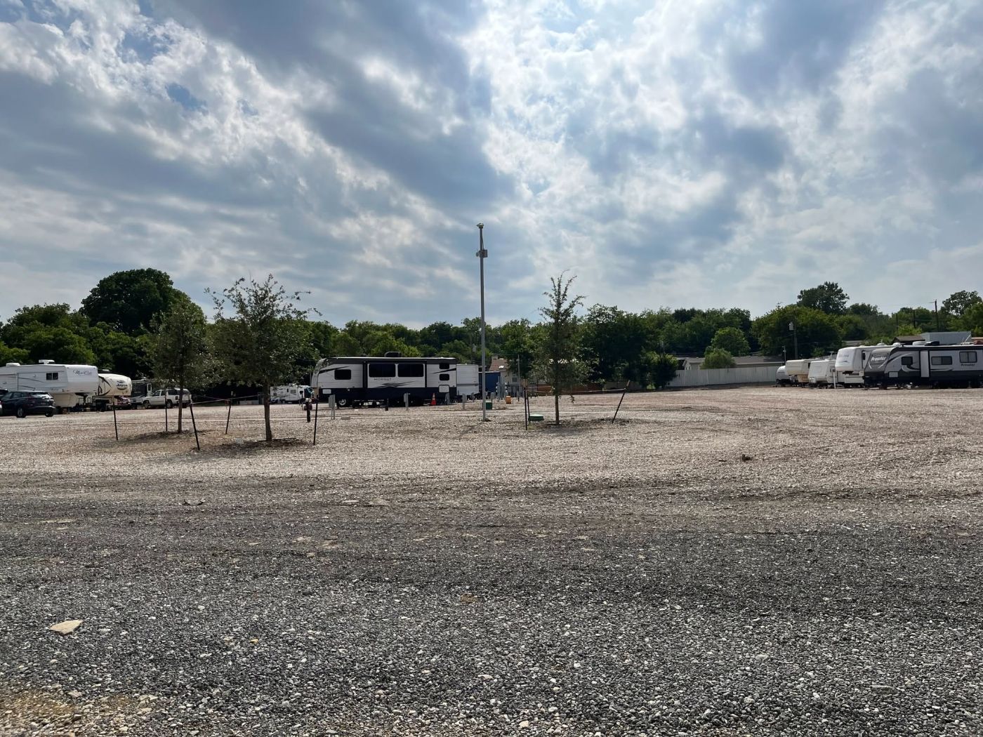 Gravel RV sites with newly planted shade trees
